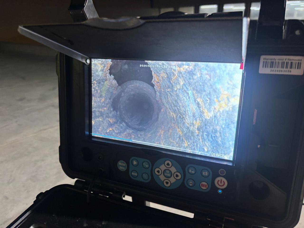 CCTV camera display showing the inside of a drainage pipe